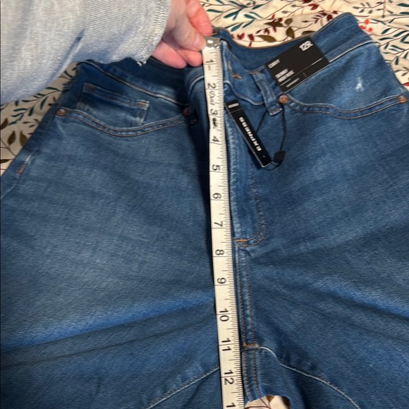 Express Blue Skinny Jeans with Faded Denim Look - Picture 5 of 7